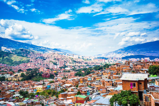 view over buildings of Comuna 13 in Medellin, Colombia Panoramic view over buildings of Comuna 13 in Medellin, Colombia guerrilla warfare photos stock pictures, royalty-free photos & images