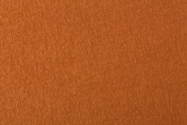 istock Orange felt fabric texture background. High quality texture in extremely high resolution. 1174782000