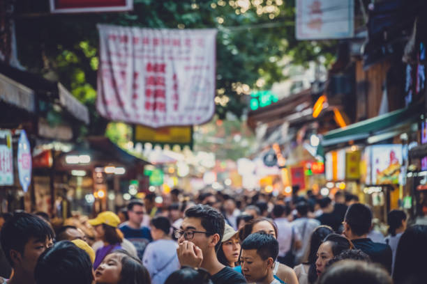 Xian, China -  July 2019 : Crowds visiting the popular street food district called Muslim Quarter in Xian, Shaanxi Province