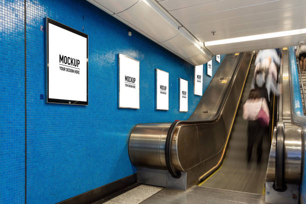 istock Blank billboard located in underground hall or subway for advertising, mockup concept, Low light speed shutter 1174782447