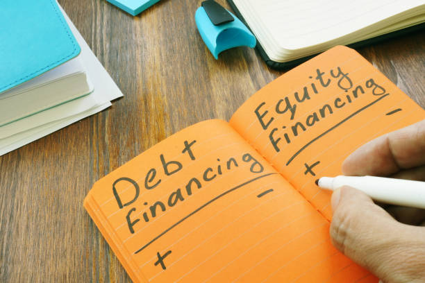 istock Debt Financing vs Equity Financing sign in the note. 1174783561