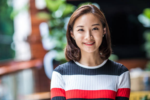 Portrait of a young asian female entrepreneur. stock photo
