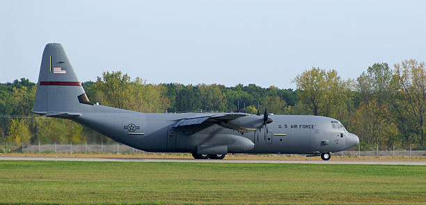 istock military cargo airplane C130 Hercules during take off 117478994