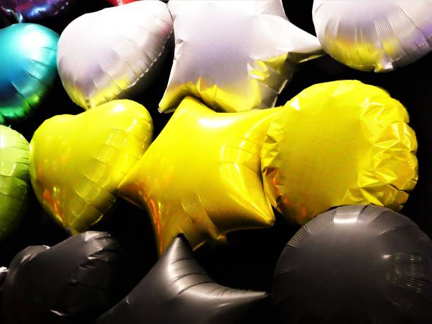 istock Round, Star and Heart Shaped Helium Balloons 1174790901