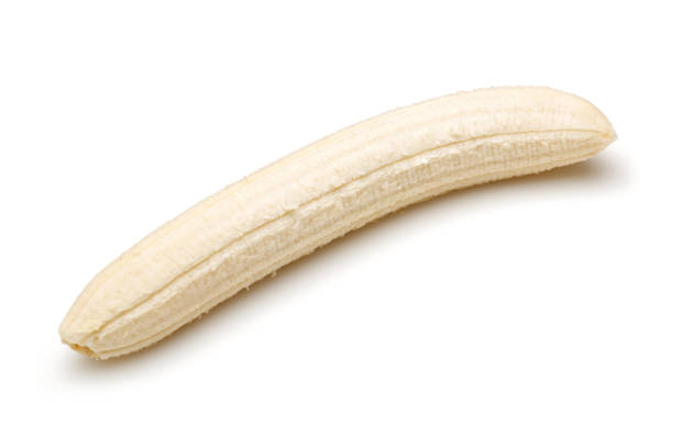 Peeled ripe banana isolated on white