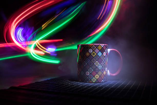 istock Beautiful eastern style textured ceramic cup of coffee (or tea) with smoke over dark toned background. 1174794264