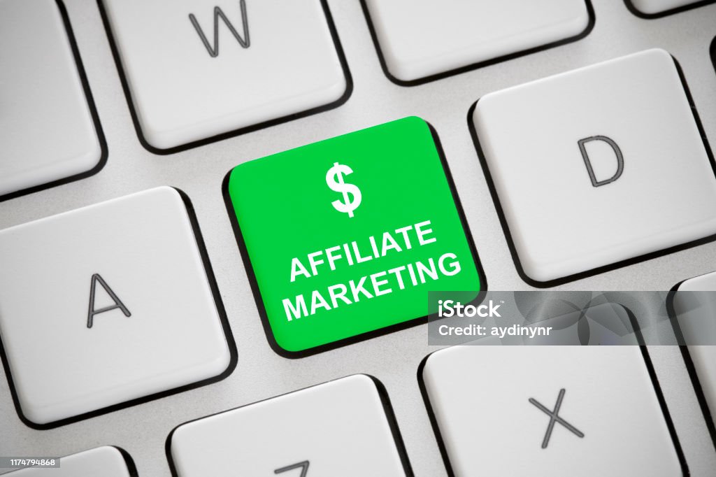 Affiliate marketing Red "Affiliate marketing" written on computer keyboard. Marketing Stock Photo