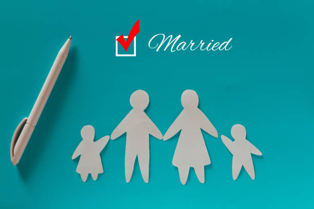 istock Paper family on blue background 1174800974