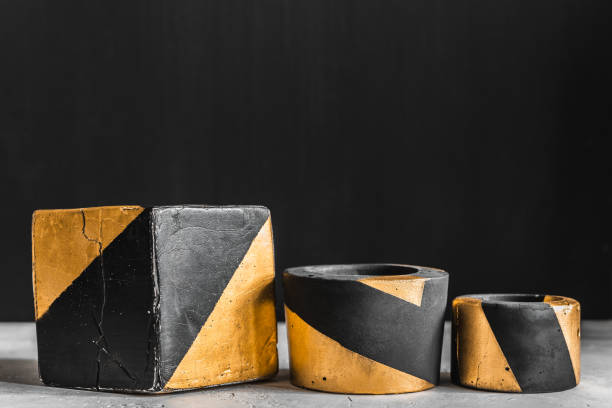 istock Empty pots handmade concrete black and gold color for succulents and cacti. 1174803111