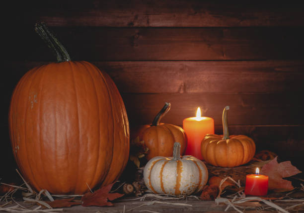 istock Group of Pumpkins and Candles 1174803114