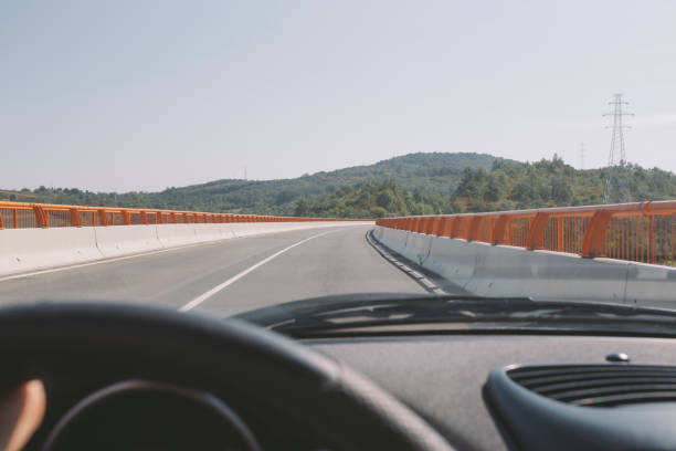 istock Traveling by car. Personal perspective of driver. 1174803404