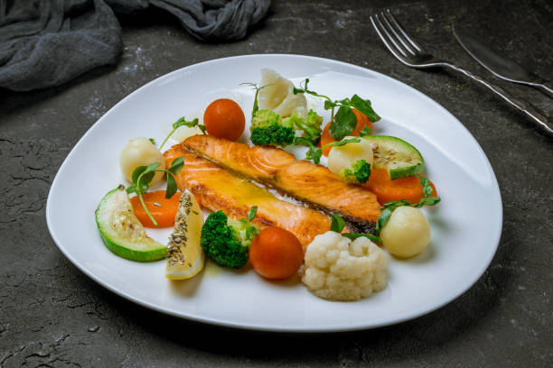 istock Salmon steak on the grill 1174804604