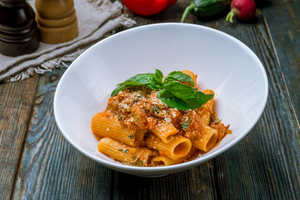 Pasta rigatoni on plate Pasta rigatoni on plate rigatoni stock pictures, royalty-free photos & images