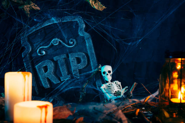 istock Halloween background,Skeleton Bones, gloomy and dark atmosphere, stretched web in the background 1174804976