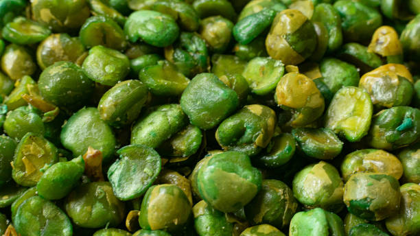 istock salted peas on black Ceramic Plate close up image. 1174805088