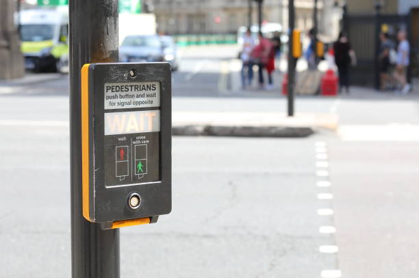 istock Pedestrian crossing button London UK 1174806391