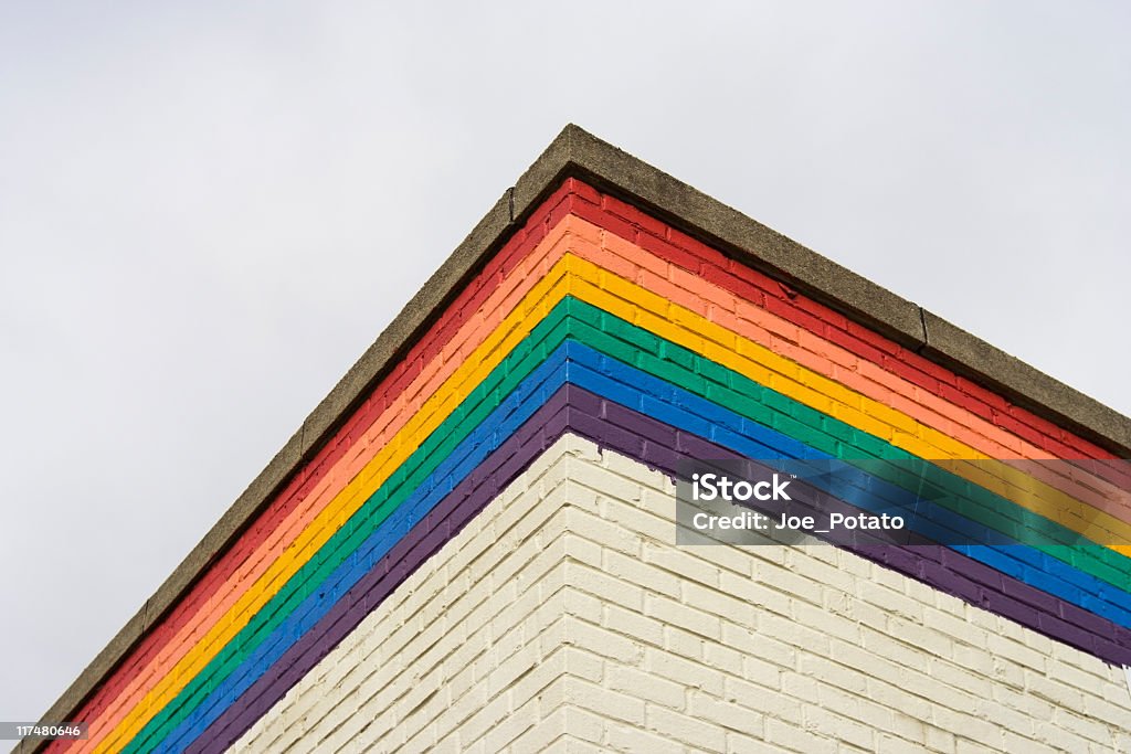 Rainbow Corner Top corner of building in rainbow colors Brick Stock Photo
