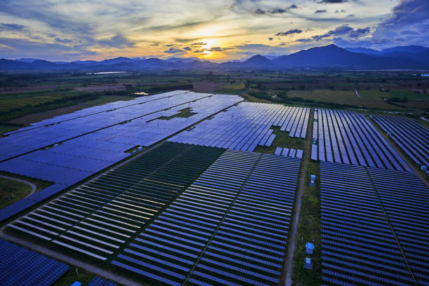istock Aerial solar photovoltaic panel at sunset 1174806471