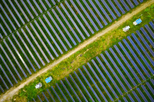 istock Aerial solar photovoltaic panel at sunset 1174806488