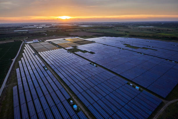 istock Aerial solar photovoltaic panel at sunset 1174807006