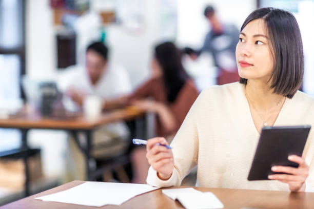 istock Businesswoman in a coworking place. 1174807603