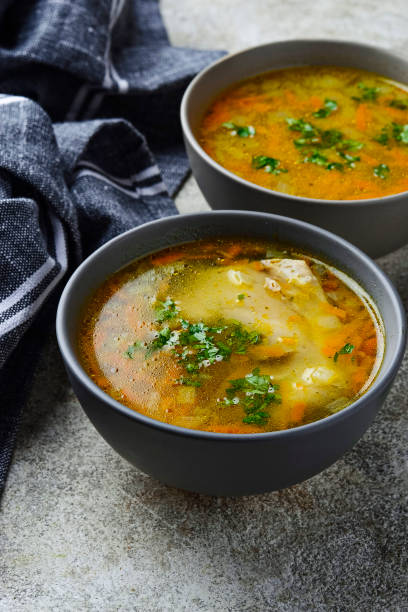 istock Chicken broth or soup with vegetable 1174809417
