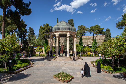 The mausoleum of the famous Iranian Poet Hafez. Many people come to touch his tomb by respect and to bring themself luck.