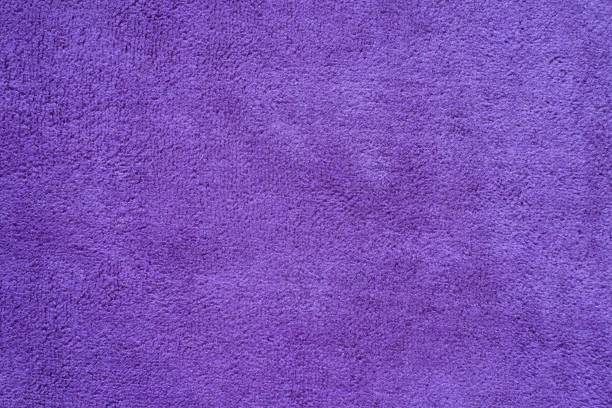 istock close-up purple fabric textile texture background 1174814970