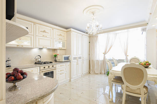 istock Luxury modern beige and cream colored kitchen interior 1174815132