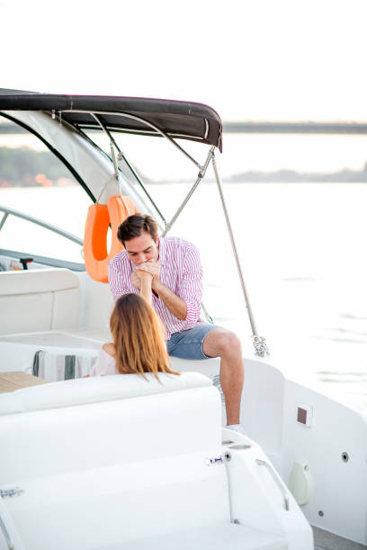 istock Happy couple on a yacht 1174816185