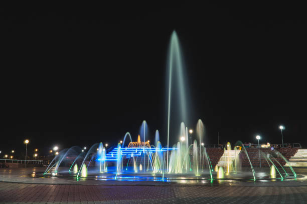 istock backlit night fountain in a big city 1174816226