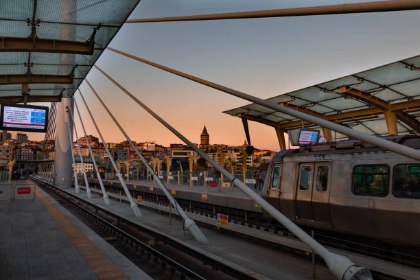 Istanbul, Turkey - September 14, 2019. Golden Horn Metro Bridge and Galata Tower in Istanbul City