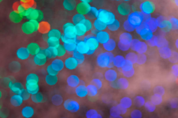 istock Colorful prism confetti blurred festive bokeh backdrop, trendy sparkles and glitter background, flat lay. Christmas and holidays concept, 2020 new year celebration 1174816723
