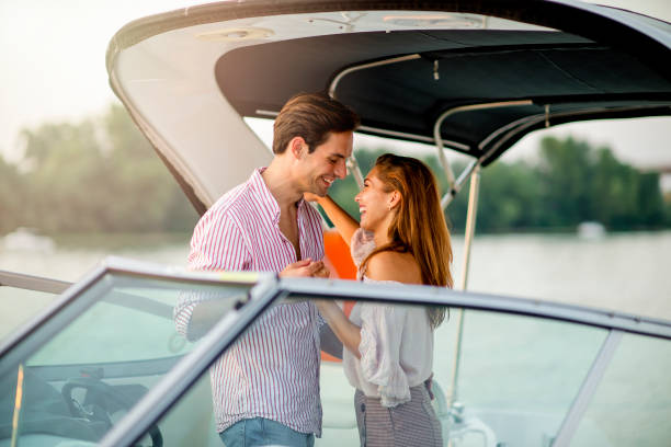 istock Happy couple on a yacht 1174816747