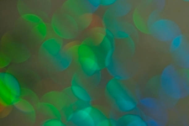 istock Colorful prism confetti blurred festive bokeh backdrop, trendy sparkles and glitter background, flat lay. Christmas and holidays concept, 2020 new year celebration 1174816801