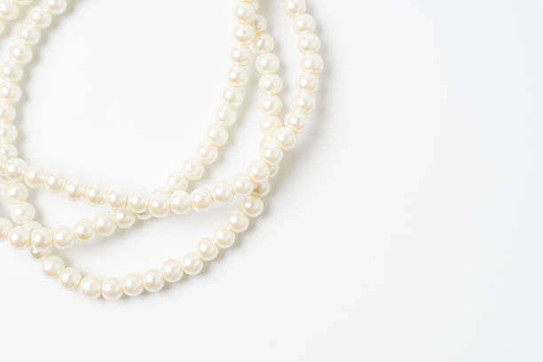 istock pearl necklace isolated on white background 1174817838