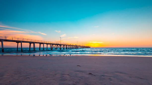 istock Port Noarlunga jetty and beach  at sunset 1174817888