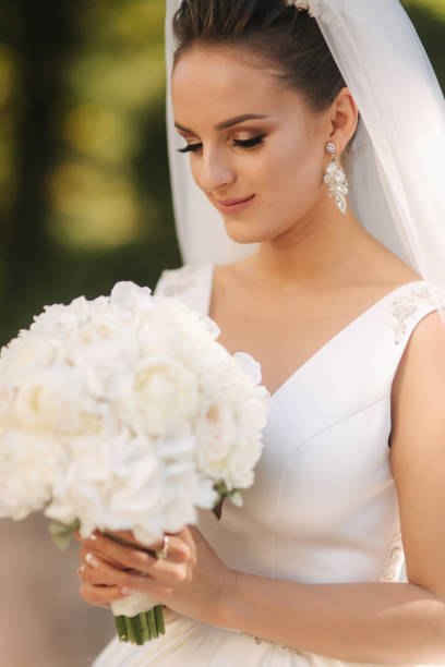 istock Closeup of wedding bouquet in brides hands 1174818884