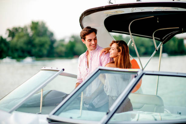 istock Happy couple on a yacht 1174818942