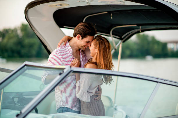 istock Happy couple on a yacht 1174818983