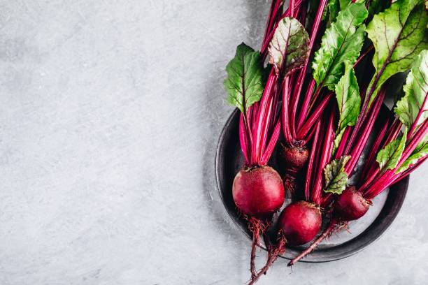 istock Bunch of fresh raw organic beets with leaves 1174819144