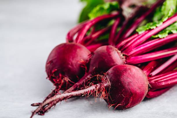 istock Bunch of fresh raw organic beets with leaves 1174819158