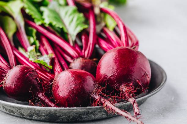 istock Bunch of fresh raw organic beets with leaves 1174819224