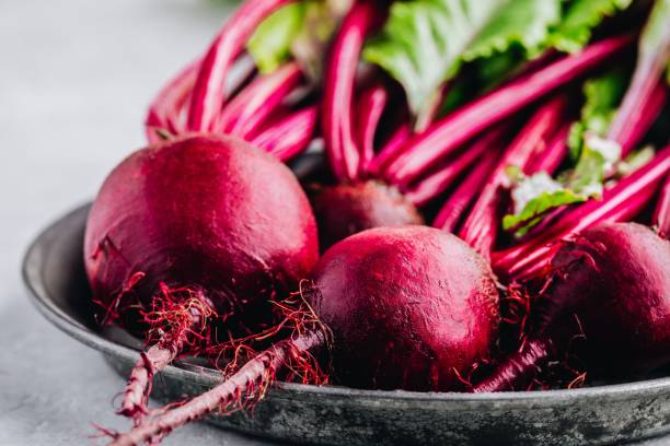 istock Bunch of fresh raw organic beets with leaves 1174819242
