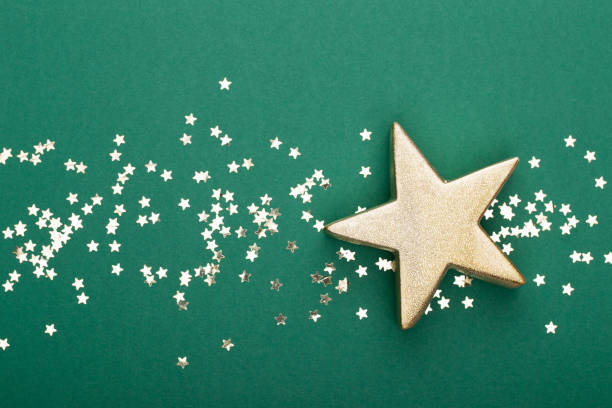 istock Christmas composition. Christmas golden glittering decorations on color background. Flat lay, top view, copy space - Image 1174820566