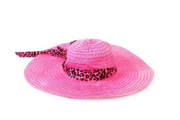 istock Pretty straw hat with ribbon and bow on white background. Beach hat 1174823136