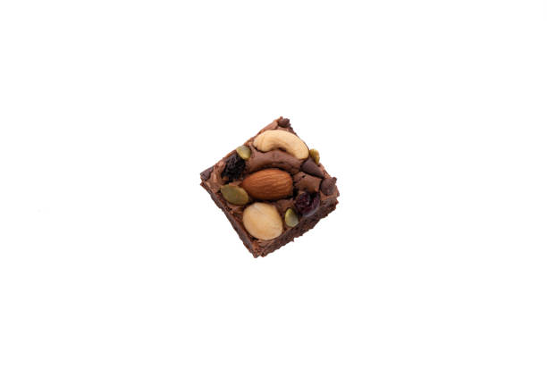 istock brownie with almond and macadamia on isolated white background 1174825861
