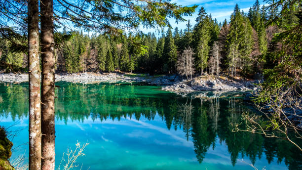 istock Spring morning at the alpine lake 1174825862