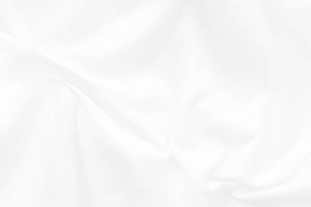istock White cloth background abstract. Fabric is wrinkled and sofe wave. Material are used in textile assembly. Christmas, winter, new year concept for backdrop design. Flat lay, copy space 1174828384