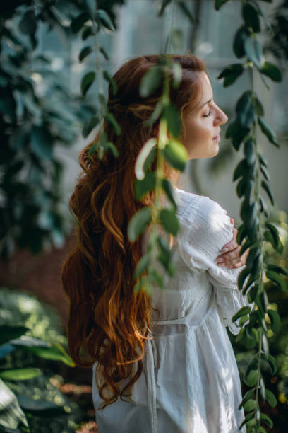 istock Dreamy woman in tropical environment 1174831283